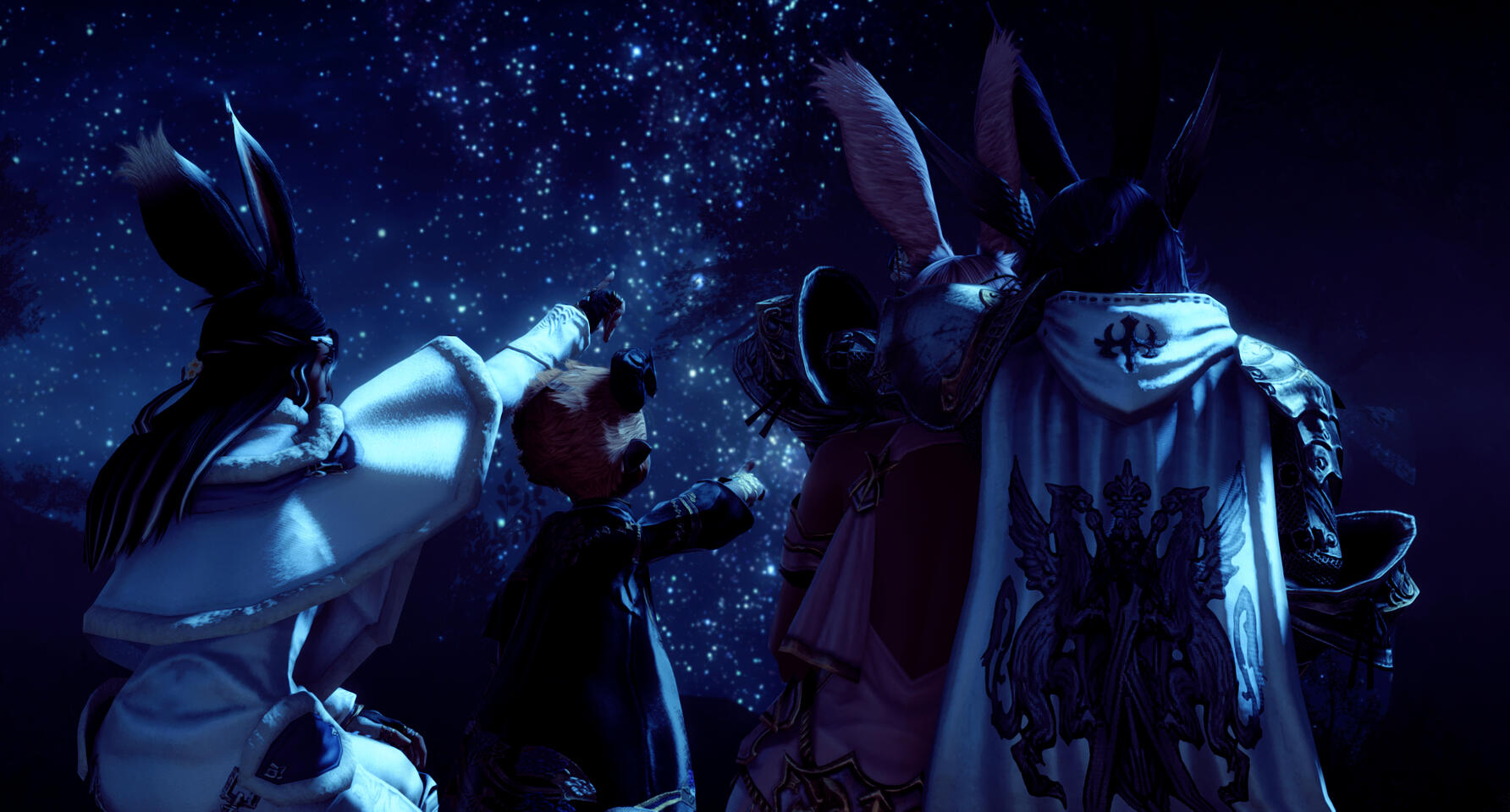 24/03/2024 Gpose of a group of friends looking up at the stars in the night sky. Taken on 24/03/2024